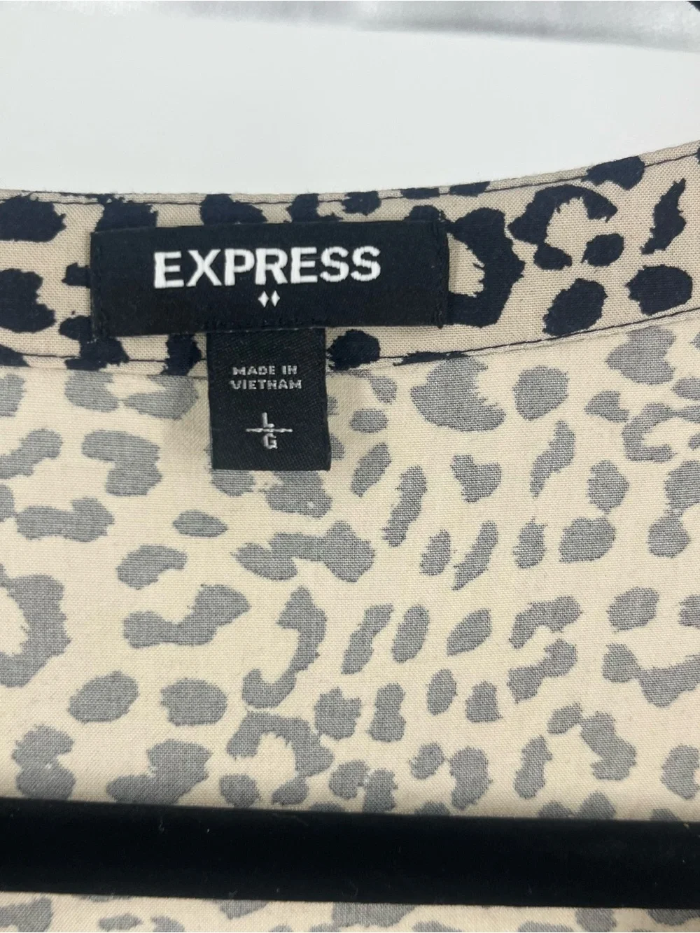 Express Beige and Black Leopard Print Peplum Tunic